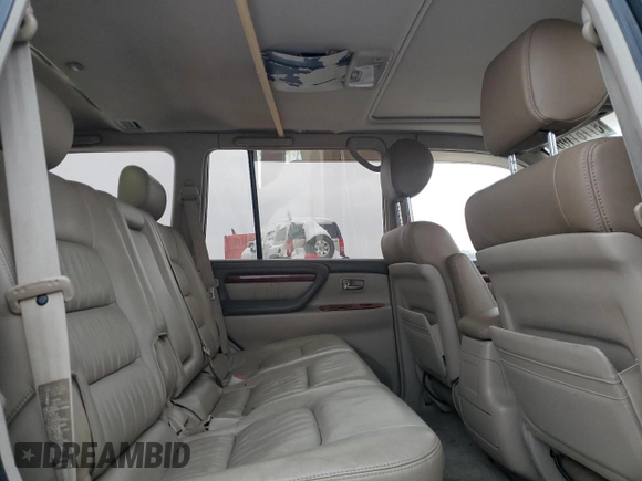 2002 Lexus LX 470 z VIN JTJHT00W923514121, wystawiony jako Copart lot #87761105 z przebiegiem 247 752 mil mil oraz Szkody całkowita. Historia ofert i sprzedaży dostępna na DreamBid. Obrazek 11.
