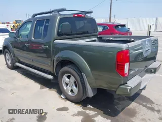 2005 Nissan Frontier LE with VIN 1N6AD07U05C449750, listed as a IAAI auction lot 42658701 with 104,630 mi miles and . Bid and sale history available at DreamBid. Image 3.