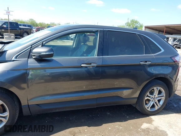 2015 Ford Edge Titanium z VIN 2FMPK4K83FBB30411, wystawiony jako IAAI lot #42230235 z przebiegiem 69 094 mil mil oraz . Historia ofert i sprzedaży dostępna na DreamBid. Obrazek 15.