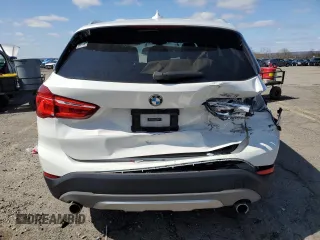 2018 BMW X1 xDrive28i with VIN WBXHT3C30J5F92074, listed as a Copart auction lot 51069535 with 116,381 mi miles and Salvage Title. Bid and sale history available at carsss.com. Image 6.