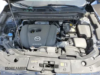 2022 Mazda CX-5 2.5 S Premium Package with VIN JM3KFBDMXN0559814, listed as a Copart auction lot 50985535 with 34,612 mi miles and Salvage Title. Bid and sale history available at carsss.com. Image 13.