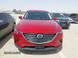 2016 Mazda CX-9 Touring z VIN JM3TCACY9G0102524, wystawiony jako IAAI lot #42305452 z przebiegiem 76 892 mil mil oraz . Historia ofert i sprzedaży dostępna na DreamBid. Obrazek 12.