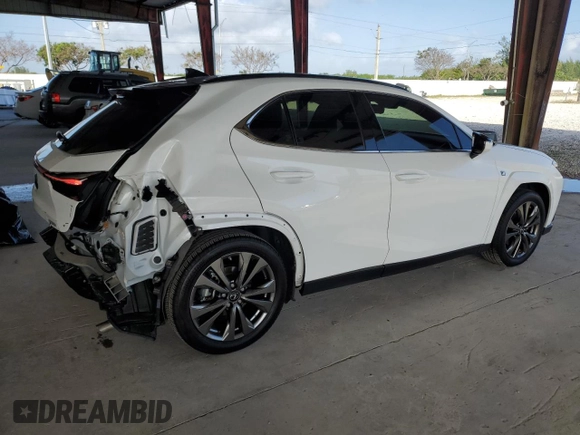 2023 Lexus UX 250h F Sport с VIN JTHR6JBH2P2150820, выставлен на аукционе Copart как лот 77956114 с пробегом 9 422 миль миль и Списание • Salvage title. История ставок и продаж доступна на DreamBid. Изображение 3.