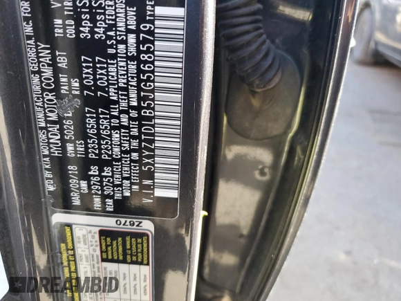2018 Hyundai Santa Fe 2.4L z VIN 5XYZTDLB5JG568579, wystawiony jako Copart lot #82534794 z przebiegiem 130 032 mil mil oraz Szkoda całkowita • Salvage title. Historia ofert i sprzedaży dostępna na DreamBid. Obrazek 13.
