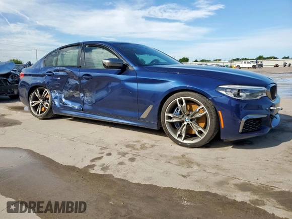 2020 BMW 5 Series M550i xDrive with VIN WBAJS7C09LCE06865, listed as a Copart auction lot 60140955 with Not provided miles and Salvage title. Bid and sale history available at DreamBid. Image 4.