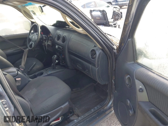 2002 Jeep Liberty Sport with VIN 1J4GL48K32W324864, listed as a IAAI auction lot 41962179 with 147,988 mi miles. Bid and sale history available at carsss.com. Image 5.