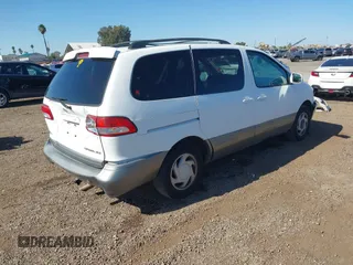 2002 Toyota Sienna LE with VIN 4T3ZF13C62U444564, listed as a IAAI auction lot 41515466 with 284,745 mi miles. Bid and sale history available at carsss.com. Image 4.