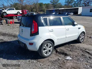 2012 Kia Soul + with VIN KNDJT2A64C7470988, listed as a IAAI auction lot 41082059 with 124,592 mi miles. Bid and sale history available at carsss.com. Image 4.