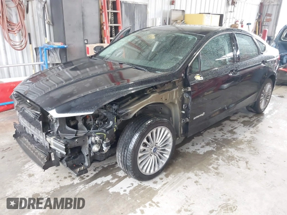 2013 Ford Fusion Titanium Hybrid with VIN 3FA6P0RU4DR281789, listed as a IAAI auction lot 41909115 with 161,008 mi miles and . Bid and sale history available at DreamBid. Image 18.