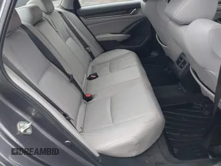 2020 Honda Accord Touring with VIN 1HGCV3F91LA009294, listed as a IAAI auction lot 41160588 with 84,937 mi miles and . Bid and sale history available at DreamBid. Image 8.