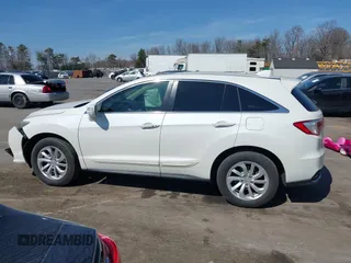2016 Acura RDX Technology with VIN 5J8TB4H54GL009695, listed as a IAAI auction lot 41784860 with 115,184 mi miles and . Bid and sale history available at carsss.com. Image 14.