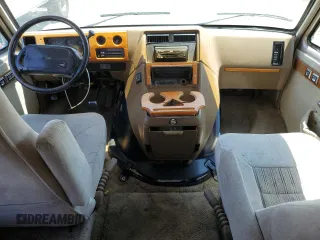 1994 GMC Vandura z VIN 1GDEG25K4RF512695, wystawiony jako Copart lot #63562414 z przebiegiem 171 855 mil mil oraz Szkody całkowita. Historia ofert i sprzedaży dostępna na DreamBid. Obrazek 8.