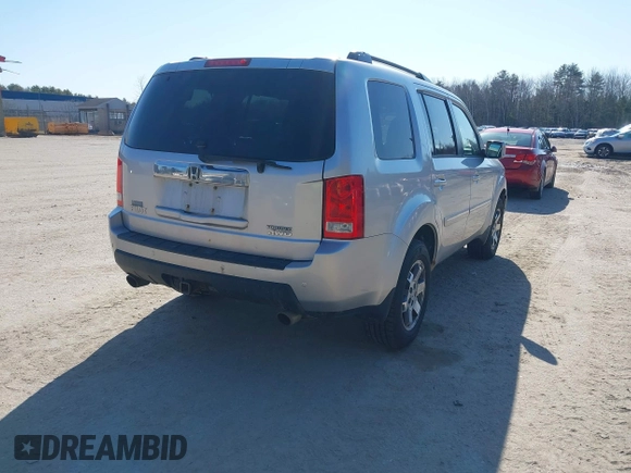 2011 Honda Pilot Touring with VIN 5FNYF4H96BB012122, listed as a IAAI auction lot 42071924 with 211,000 mi miles. Bid and sale history available at carsss.com. Image 4.