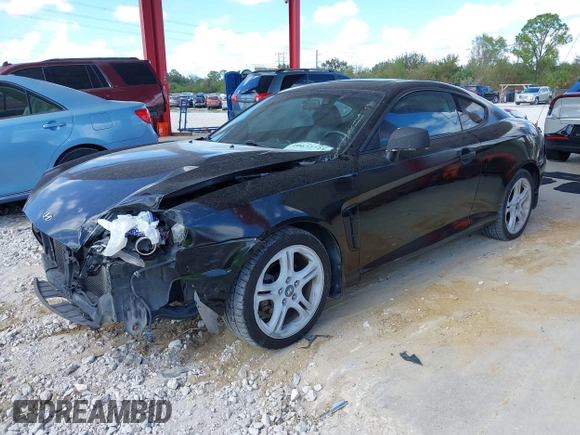 2006 Hyundai Tiburon GT z VIN KMHHN65F56U224768, wystawiony jako IAAI lot #40672721 z przebiegiem 158 535 mil mil oraz . Historia ofert i sprzedaży dostępna na DreamBid. Obrazek 18.