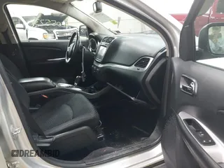 2013 Dodge Journey SXT with VIN 3C4PDCBBXDT661479, listed as a IAAI auction lot 42055731 with 151,963 mi miles. Bid and sale history available at carsss.com. Image 5.