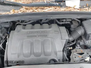 2005 Honda Odyssey TOURING with VIN 5FNRL38815B027811, listed as a IAAI auction lot 42105642 with 303,913 mi miles. Bid and sale history available at carsss.com. Image 10.
