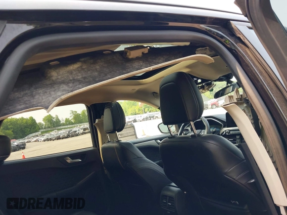 2020 Ford Escape SE Sport Hybrid with VIN 1FMCU9BZ4LUC25970, listed as a IAAI auction lot 42404984 with 102,651 mi miles and . Bid and sale history available at DreamBid. Image 6.