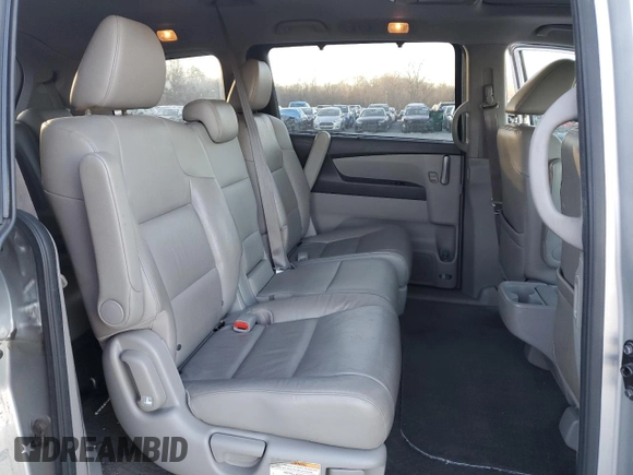 2012 Honda Odyssey Touring with VIN 5FNRL5H9XCB027758, listed as a Copart auction lot 86058504 with 164,860 mi miles and Salvage Title. Bid and sale history available at DreamBid. Image 12.