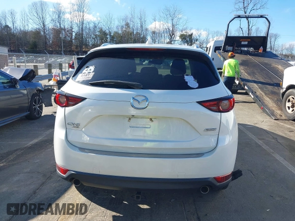 2018 Mazda CX-5 Grand Touring with VIN JM3KFBDM6J0435579, listed as a IAAI auction lot 41208899 with 131,212 mi miles. Bid and sale history available at carsss.com. Image 17.