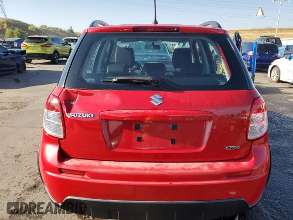 2010 Suzuki SX4 z VIN JS2YB5A36A6302478, wystawiony jako Copart lot #73855954 z przebiegiem 132 272 mil mil oraz Szkody całkowita. Historia ofert i sprzedaży dostępna na DreamBid. Obrazek 6.