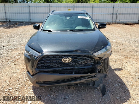 2023 Toyota Corolla Cross LE with VIN 7MUCAAAG3PV058094, listed as a Copart auction lot 57983105 with 30,593 mi miles and Salvage title. Bid and sale history available at DreamBid. Image 5.