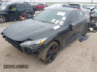 2020 Kia Stinger GT with VIN KNAE35LC2L6078391, listed as a IAAI auction lot 41409482 with 63,146 mi miles. Bid and sale history available at carsss.com. Image 2.