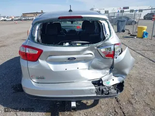 2013 Ford C-Max Energi SEL with VIN 1FADP5CU1DL521392, listed as a IAAI auction lot 41976775 with 121,715 mi miles. Bid and sale history available at carsss.com. Image 16.