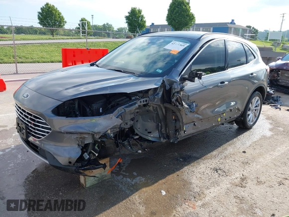 2022 Ford Escape Titanium with VIN 1FMCU9J90NUB35428, listed as a IAAI auction lot 42255369 with 33,662 mi miles and . Bid and sale history available at DreamBid. Image 19.