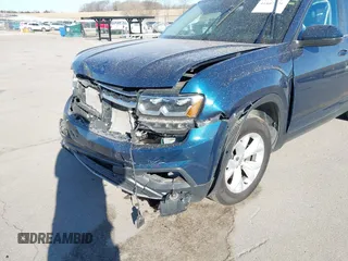 2019 Volkswagen Atlas SE z VIN 1V2WR2CA6KC564820, wystawiony jako IAAI lot #41807476 z przebiegiem 78 947 mil mil oraz . Historia ofert i sprzedaży dostępna na DreamBid. Obrazek 6.