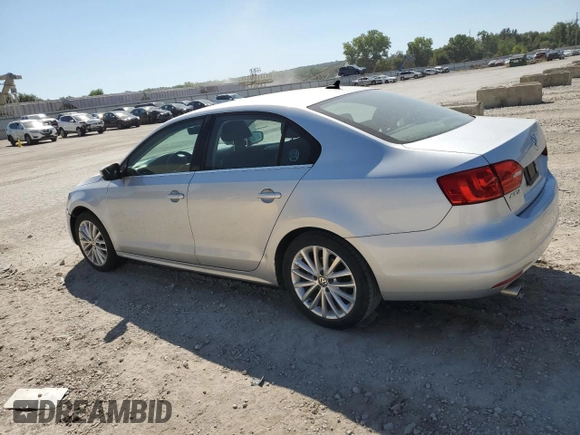2011 Volkswagen Jetta SEL with VIN 3VWLZ7AJXBM056107, listed as a Copart auction lot 69955534 with 104,451 mi miles and Salvage title. Bid and sale history available at DreamBid. Image 2.