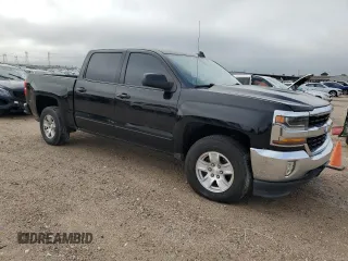 2018 Chevrolet Silverado 1500 LT with VIN 3GCUCRER4JG192458, listed as a Copart auction lot 56179635 with 96,450 mi miles and Clean Title. Bid and sale history available at DreamBid. Image 4.