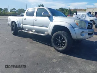 2007 Toyota Tacoma PreRunner z VIN 3TMKU72N97M012931, wystawiony jako IAAI lot #42590087 z przebiegiem 191 510 mil mil oraz . Historia ofert i sprzedaży dostępna na DreamBid. Obrazek 1.