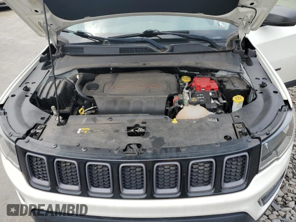 2019 Jeep Compass Trailhawk with VIN 3C4NJDDB5KT671613, listed as a Copart auction lot 61023125 with 64,793 mi miles and Salvage title. Bid and sale history available at DreamBid. Image 12.