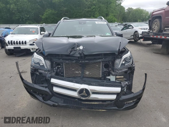 2015 Mercedes-Benz GL with VIN 4JGDF6EE7FA580014, listed as a Copart auction lot 55137704 with 115,624 mi miles and Salvage Title. Bid and sale history available at carsss.com. Image 5.