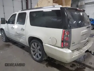 2011 GMC Yukon XL Denali with VIN 1GKS2MEF9BR221784, listed as a IAAI auction lot 41526723 with 207,632 mi miles. Bid and sale history available at carsss.com. Image 3.