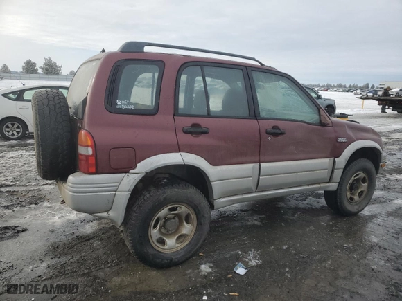 1999 Suzuki Grand Vitara JLX with VIN JS3TD62V6X4108950, listed as a Copart auction lot 46468705 with 215,541 mi miles and Salvage Title. Bid and sale history available at carsss.com. Image 3.