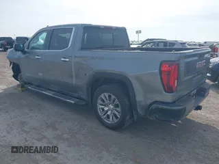 2021 GMC Sierra 1500 Denali z VIN 3GTU9FETXMG382438, wystawiony jako IAAI lot #41880365 z przebiegiem 54 651 mil mil oraz . Historia ofert i sprzedaży dostępna na DreamBid. Obrazek 3.