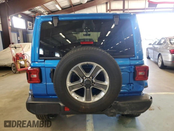 2022 Jeep Wrangler Unlimited Sahara Altitude with VIN 1C4HJXEG0NW255315, listed as a Copart auction lot 87821535 with 40,113 mi miles and Clean title. Bid and sale history available at DreamBid. Image 6.