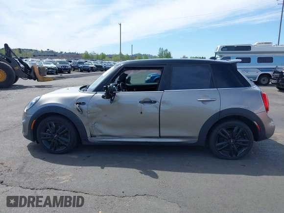 2019 MINI Hardtop 4 Door Cooper S with VIN WMWXU3C5XK2H55160, listed as a IAAI auction lot 42024249 with 49,944 mi miles and . Bid and sale history available at DreamBid. Image 14.