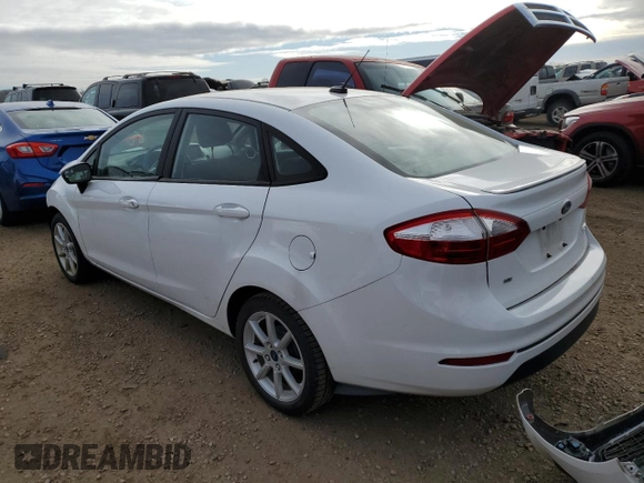 2017 Ford Fiesta SE with VIN 3FADP4BJ2HM136218, listed as a Copart auction lot 82819734 with 74,358 mi miles and Salvage Title. Bid and sale history available at DreamBid. Image 2.