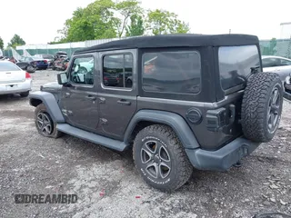 2019 Jeep Wrangler Unlimited Sport S с VIN 1C4HJXDG6KW571640, выставлен на аукционе IAAI как лот 42299078 с пробегом 51 928 миль миль и . История ставок и продаж доступна на DreamBid. Изображение 3.