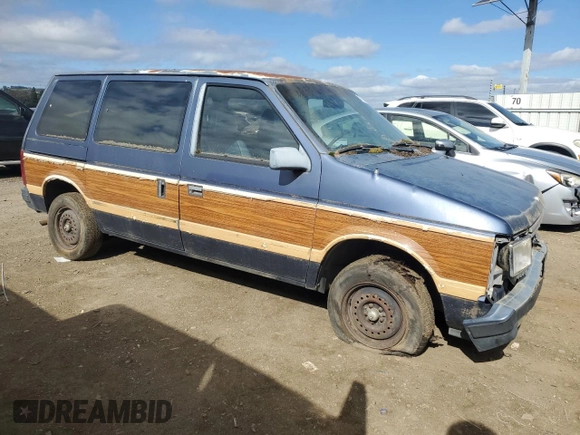 1987 Plymouth Voyager z VIN 2P4FH51G8HR130018, wystawiony jako Copart lot #47295285 z przebiegiem 68 113 mil mil oraz Tytuł czysty. Historia ofert i sprzedaży dostępna na DreamBid. Obrazek 4.