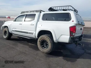2019 Toyota Tacoma SR z VIN 3TMCZ5AN6KM284101, wystawiony jako IAAI lot #41099466 z przebiegiem 36 119 mil mil oraz . Historia ofert i sprzedaży dostępna na DreamBid. Obrazek 3.