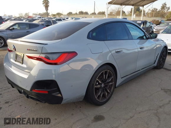 2023 BMW 4 Series M440i with VIN WBA63AW02PFN40551, listed as a IAAI auction lot 41230910 with 23,526 mi miles and . Bid and sale history available at DreamBid. Image 4.