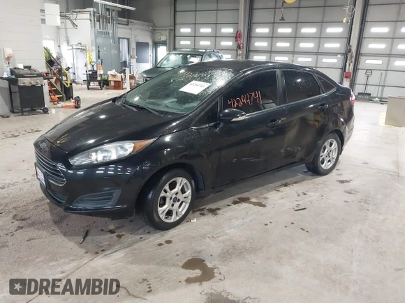 2014 Ford Fiesta SE z VIN 3FADP4BJ0EM174123, wystawiony jako IAAI lot #42294741 z przebiegiem 95 682 mil mil oraz . Historia ofert i sprzedaży dostępna na DreamBid. Obrazek 2.