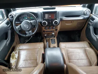 2012 Jeep Wrangler Unlimited Sahara with VIN 1C4HJWEG0CL163310, listed as a Copart auction lot 48972825 with 125,934 mi miles and Salvage Title. Bid and sale history available at carsss.com. Image 8.