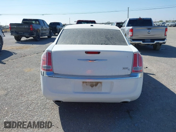 2014 Chrysler 300 with VIN 2C3CCAEG4EH312930, listed as a IAAI auction lot 41907509 with 128,940 mi miles. Bid and sale history available at carsss.com. Image 16.