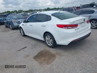 2018 Kia Optima S with VIN 5XXGT4L32JG184893, listed as a IAAI auction lot 42680521 with 55,225 mi miles and . Bid and sale history available at DreamBid. Image 3.