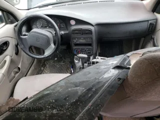 2002 Saturn SL z VIN 1G8ZH52842Z201392, wystawiony jako Copart lot #56595105 z przebiegiem Nie podano mil oraz Szkoda całkowita • Salvage title. Historia ofert i sprzedaży dostępna na DreamBid. Obrazek 8.
