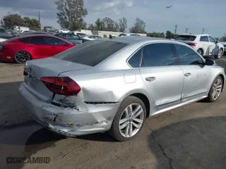 2017 Volkswagen Passat 1.8T SE w/Technology with VIN 1VWGT7A34HC071376, listed as a IAAI auction lot 41568542 with 93,974 mi miles. Bid and sale history available at carsss.com. Image 4.